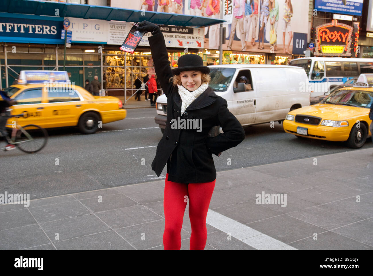 An actress in costume promotes ticket sales for the Broadway musical Chicago in Times Square Stock Photo