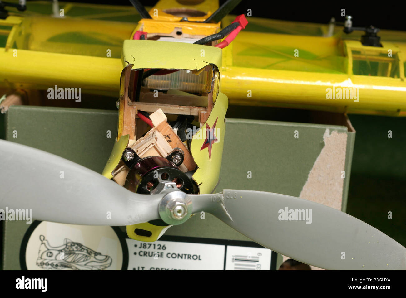 Cracked up battery powered radio controlled model aeroplane Stock Photo