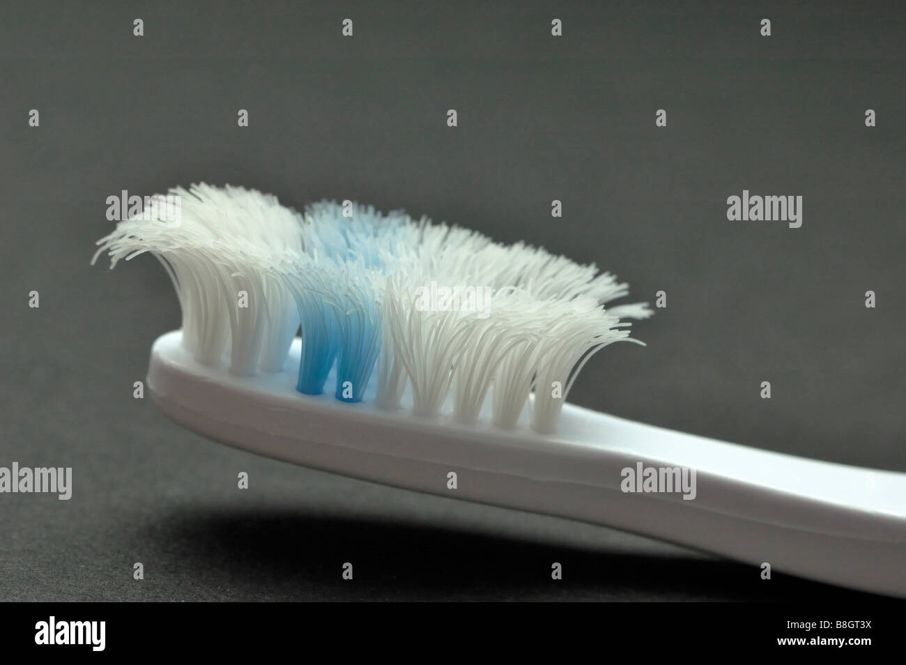 Closeup of a very worn toothbrush Stock Photo