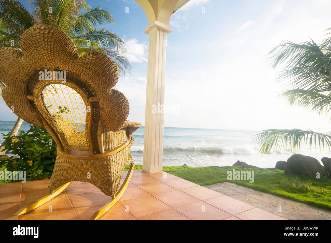 handmade wicker rocking chair on patio luxury resort hotel caribbean