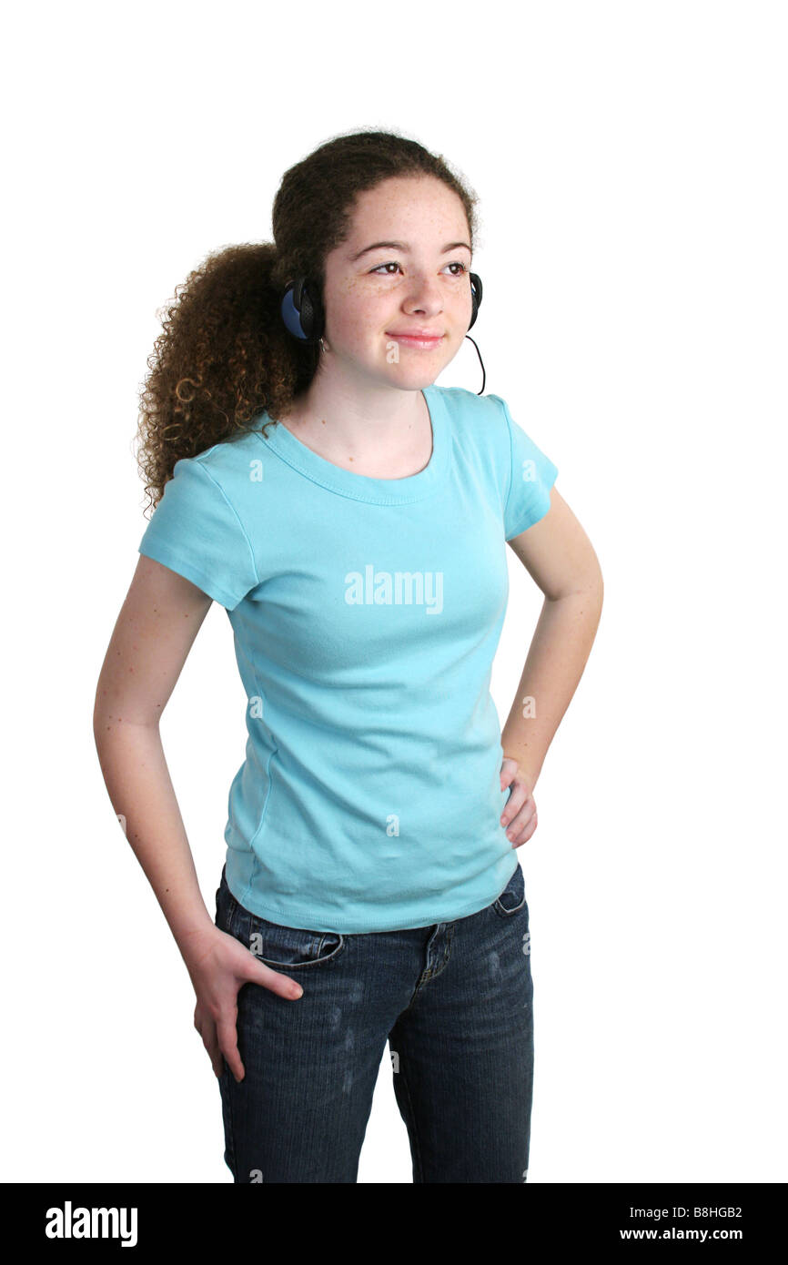 A cute teen girl modeling a blue t shirt and wearing headphones The t shirt  is blank ready for logo Stock Photo - Alamy