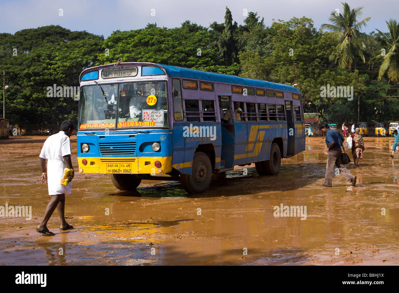 India Tamil Nadu Mayiladuthurai Bus Stand passengers boarding local