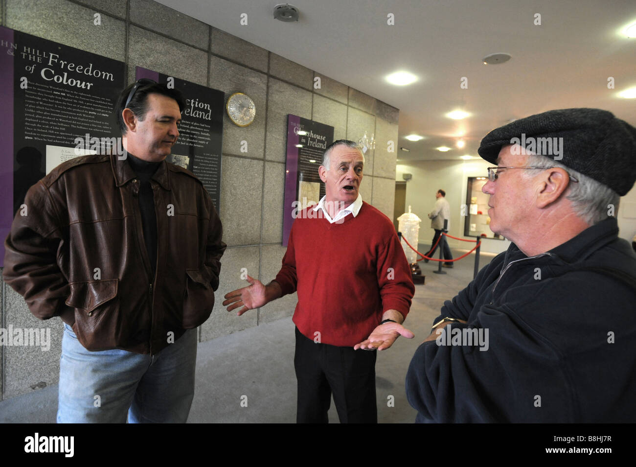 Waterford crystal occupier Ian Paul explains to tourists from that the factory is closed Stock