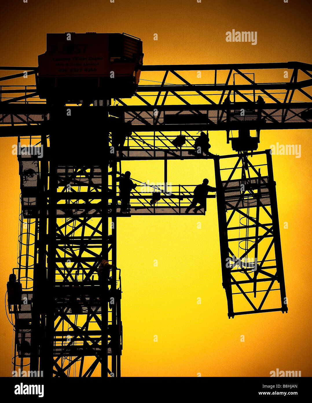 Hydraulic crane being constructed Stock Photo Alamy