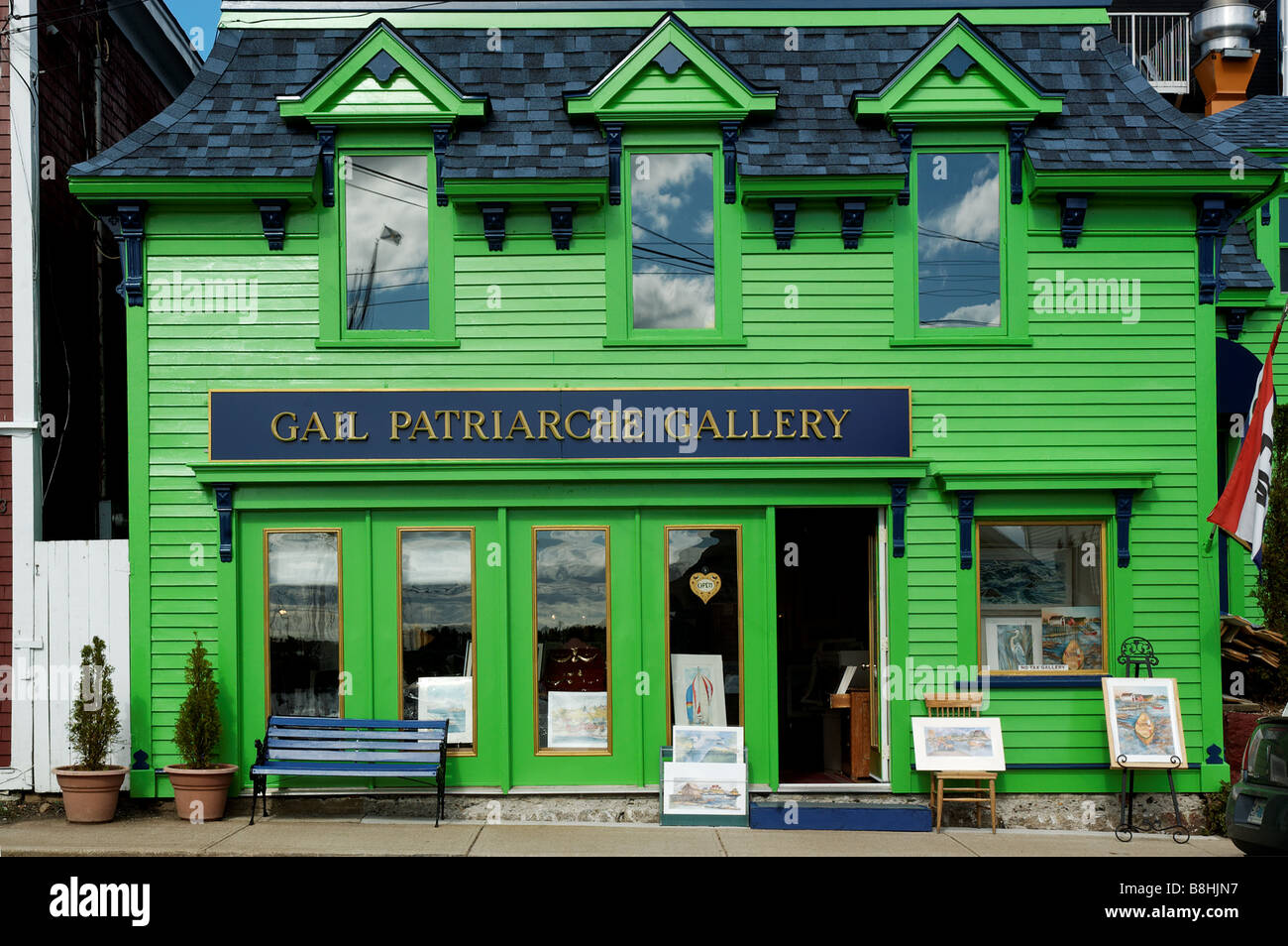 An art gallery painted bright green in Lunenburg Nova Scotia Stock