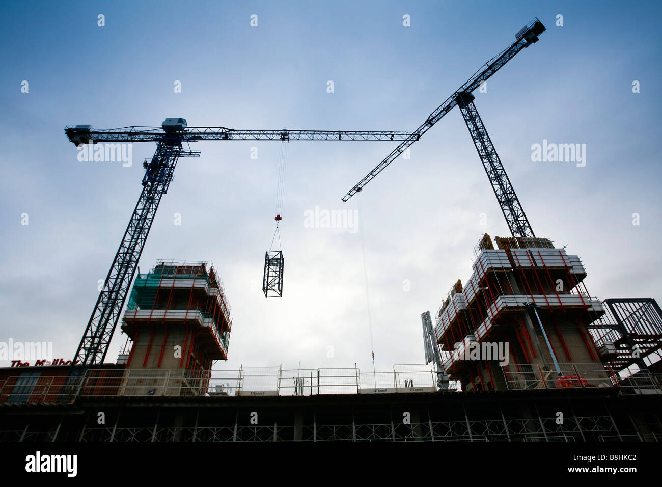 Hydraulic crane being constructed Stock Photo - Alamy