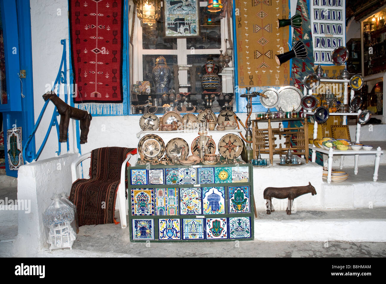 A shop's exterior display of Tunisian handicrafts in the pretty village of Sidi Bou Said near Tunis Stock Photo