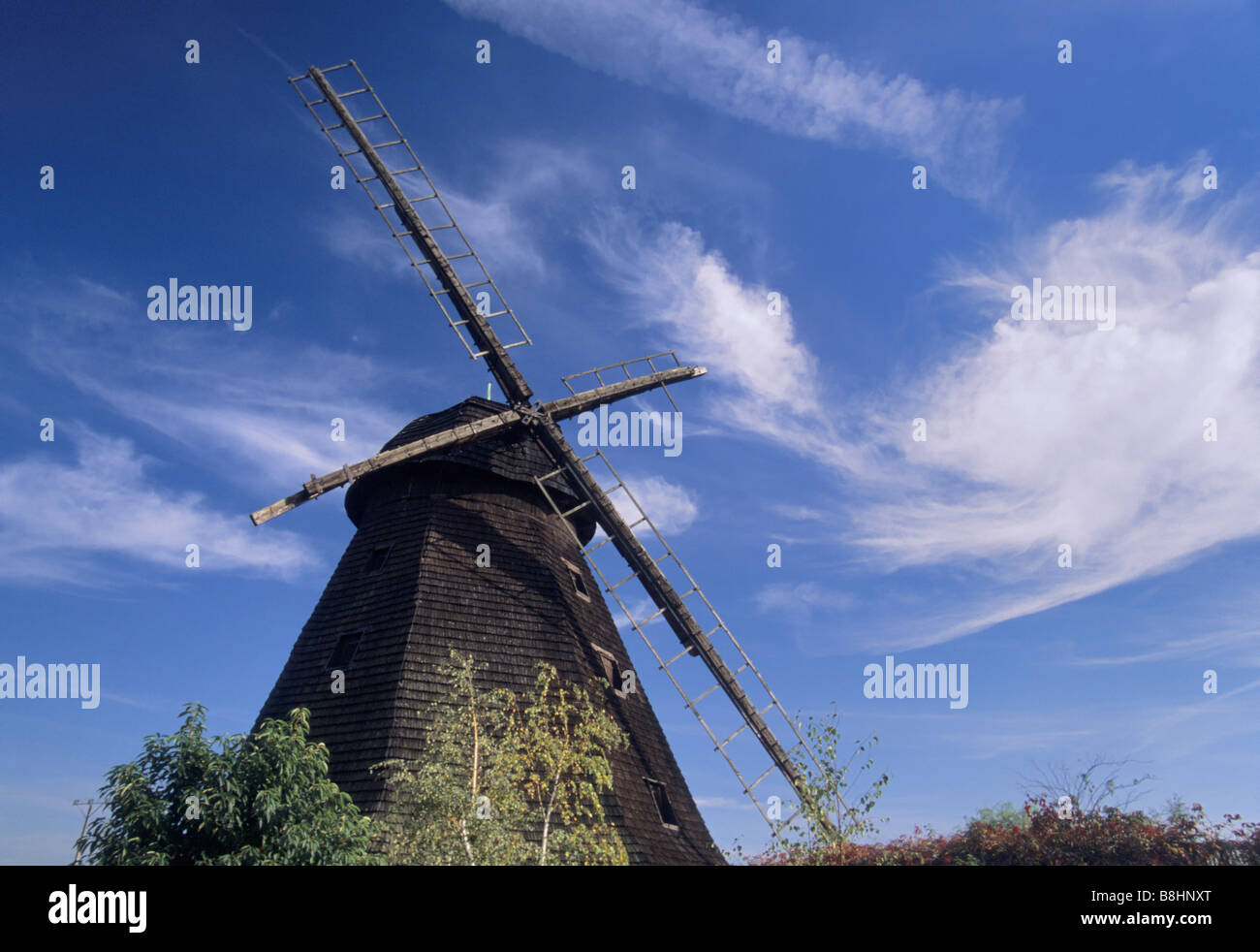 Wooden windmill converted to restaurant near town of Chojnów in Lower Silesia region Poland Stock Photo