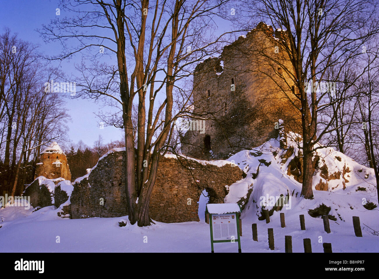 Medieval castle ruins near village of Swiecie at sunset in winter in Lower Silesia region Poland Stock Photo