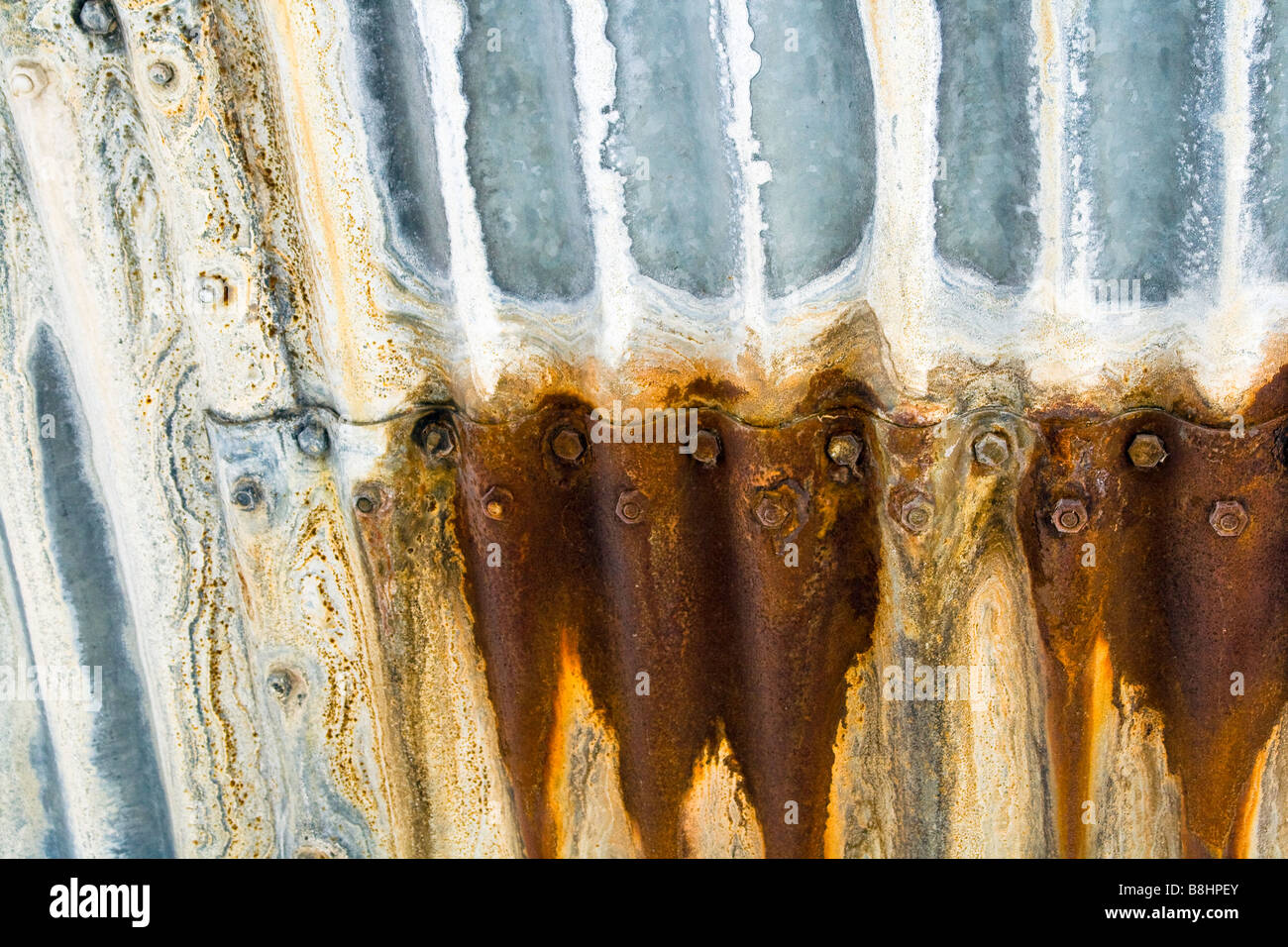 Rust on corrugated metal, close up. Stock Photo