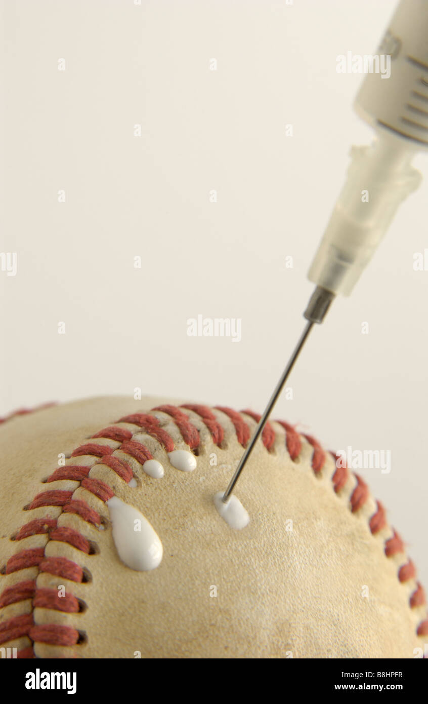 a baseball being injected with steroids Stock Photo