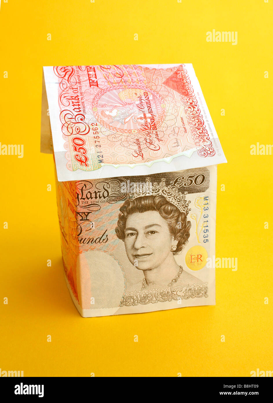Uk pound note and house hi-res stock photography and images - Alamy