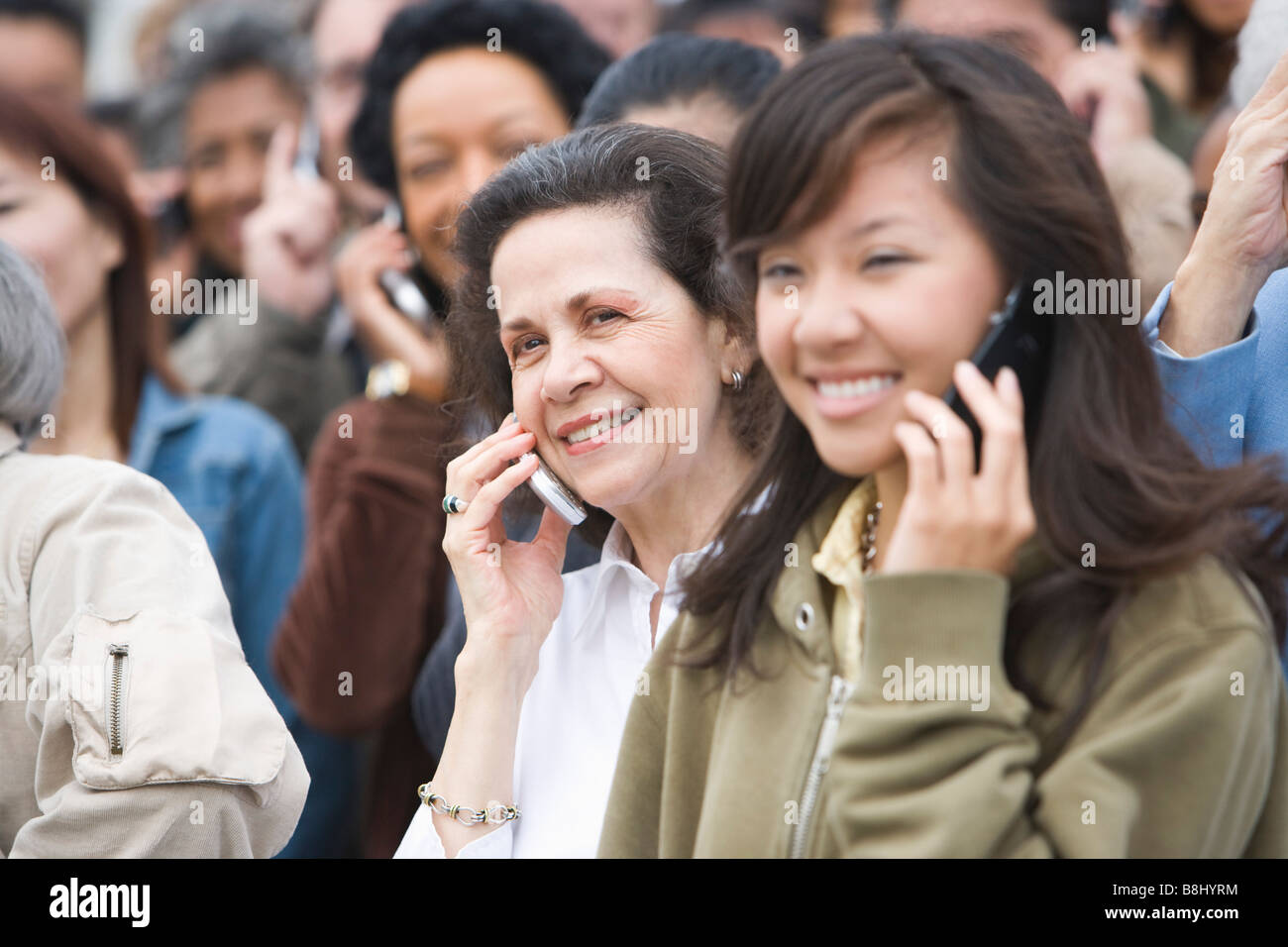 Crowd using mobile phones Stock Photo - Alamy