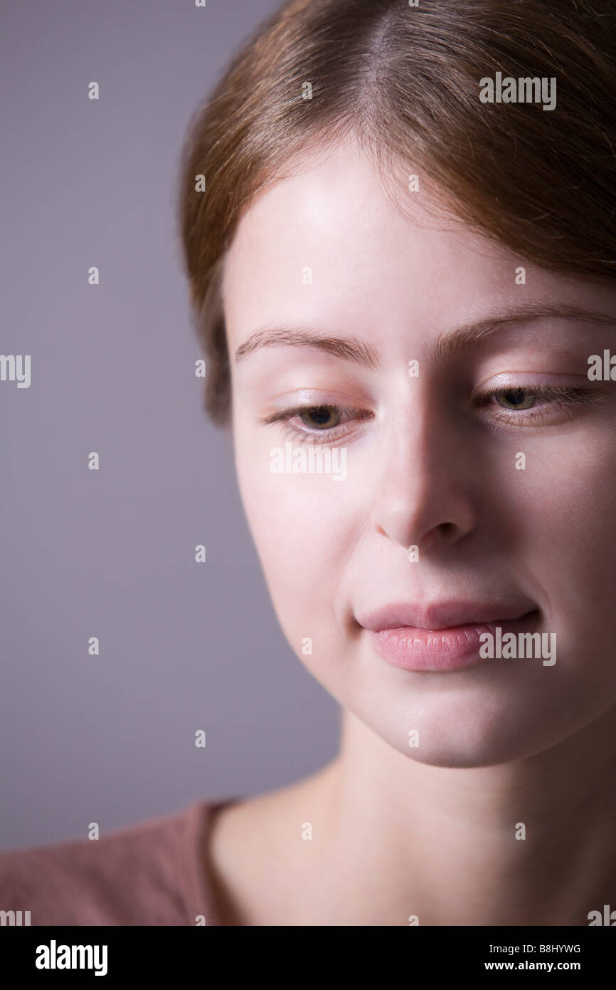 Pensive young woman, closeup Stock Photo
