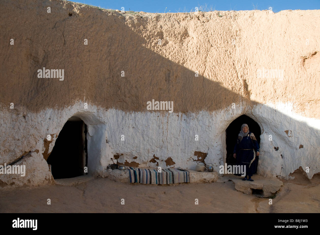 In southern Tunisia's Matmata landscape Berber families live in cave homes--simple, comfortable and always cool Stock Photo