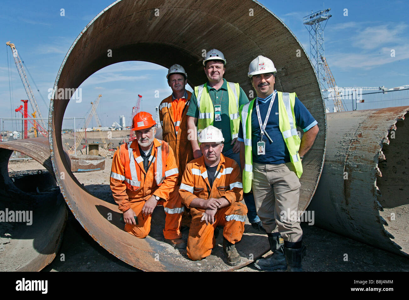 Construction is a collaborative short-term enterprise combining the skills and experience of groups of diverse individuals. Stock Photo