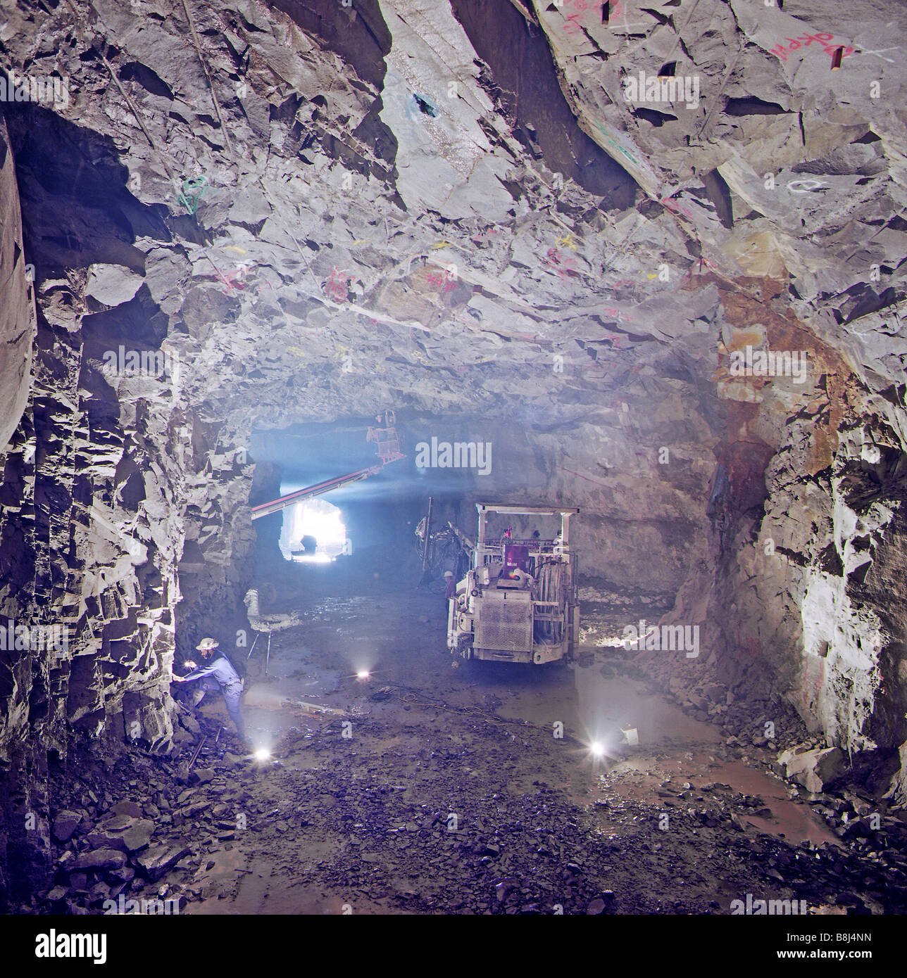 Excavation of hard rock cavern for Island West waste collection and compaction facility under Mount Davies on Hong Kong Island. Stock Photo