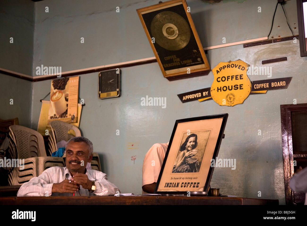 A manager sits at a desk at the Indian Coffee House in Bangalore, India