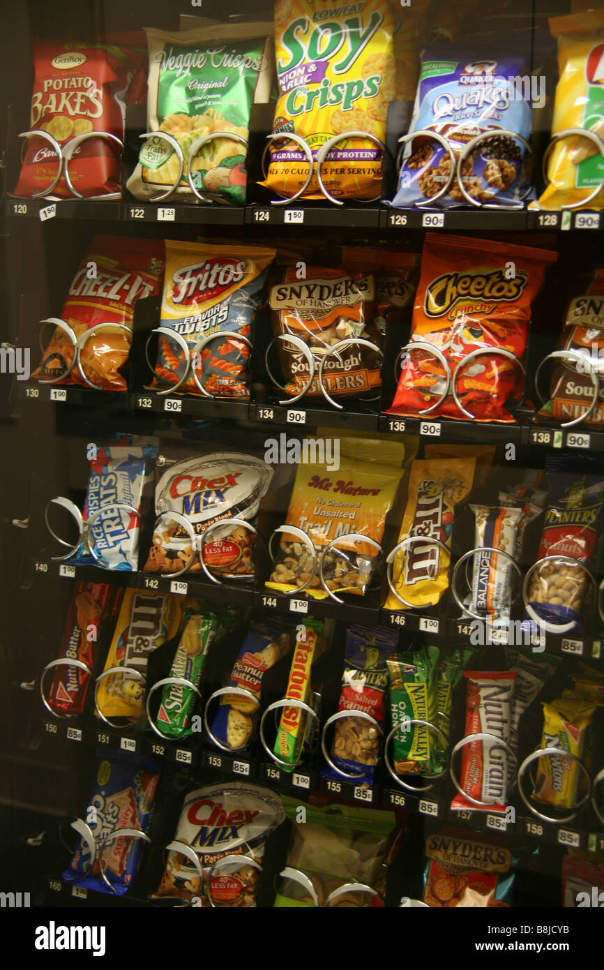 Vending machine offering a variety of snacks Stock Photo - Alamy