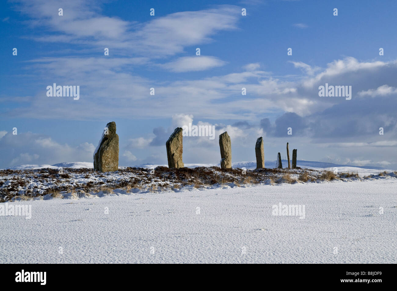dh  RING OF BRODGAR ORKNEY Stone circle neolithic henge snow bronze age britain winter historic uk menhirs standing stones scotland Stock Photo