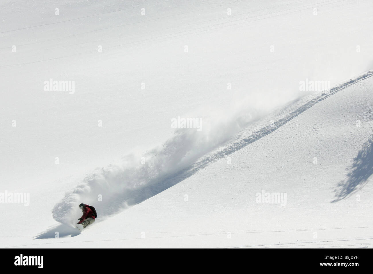 Snowboarder Anne-Fleur Eiff going downhill in Nassfeld, Austria Stock Photo