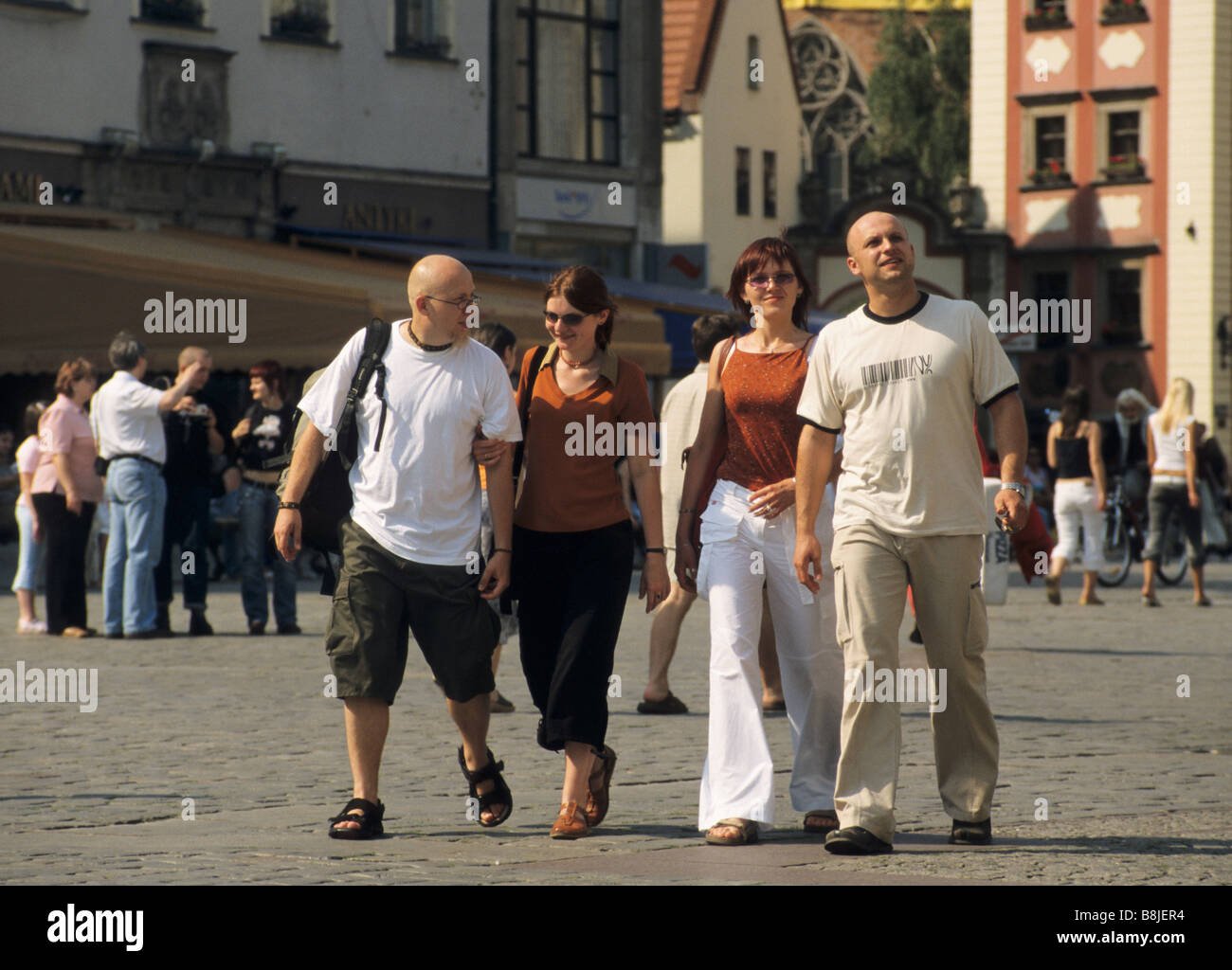Passers by at Rynek (Market Square) in Wroclaw, Poland Stock Photo