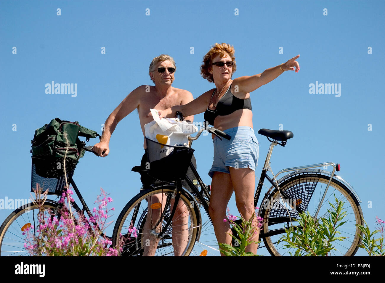 retired couple on a bicycle tour Stock Photo