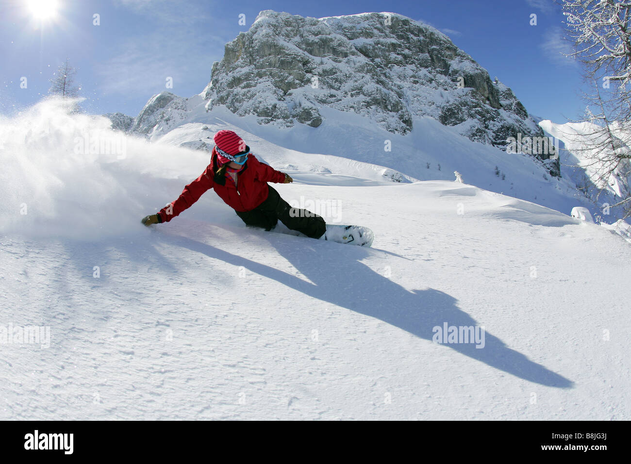 Snowboarder going downhill in Nassfeld, Austria Stock Photo