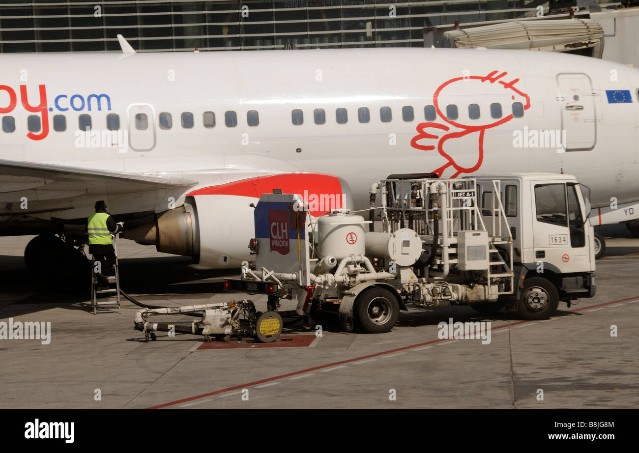 bmibaby Boeing 737 300 holiday jet being refuelled on the apron at  Malaga International Airport southern Spain Stock Photo