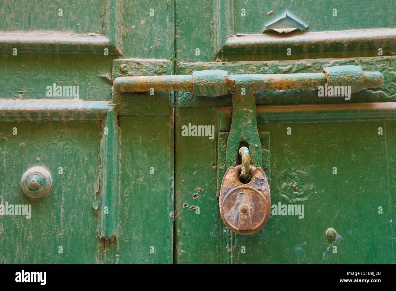 Padlock and bolt on door Stock Photo Alamy