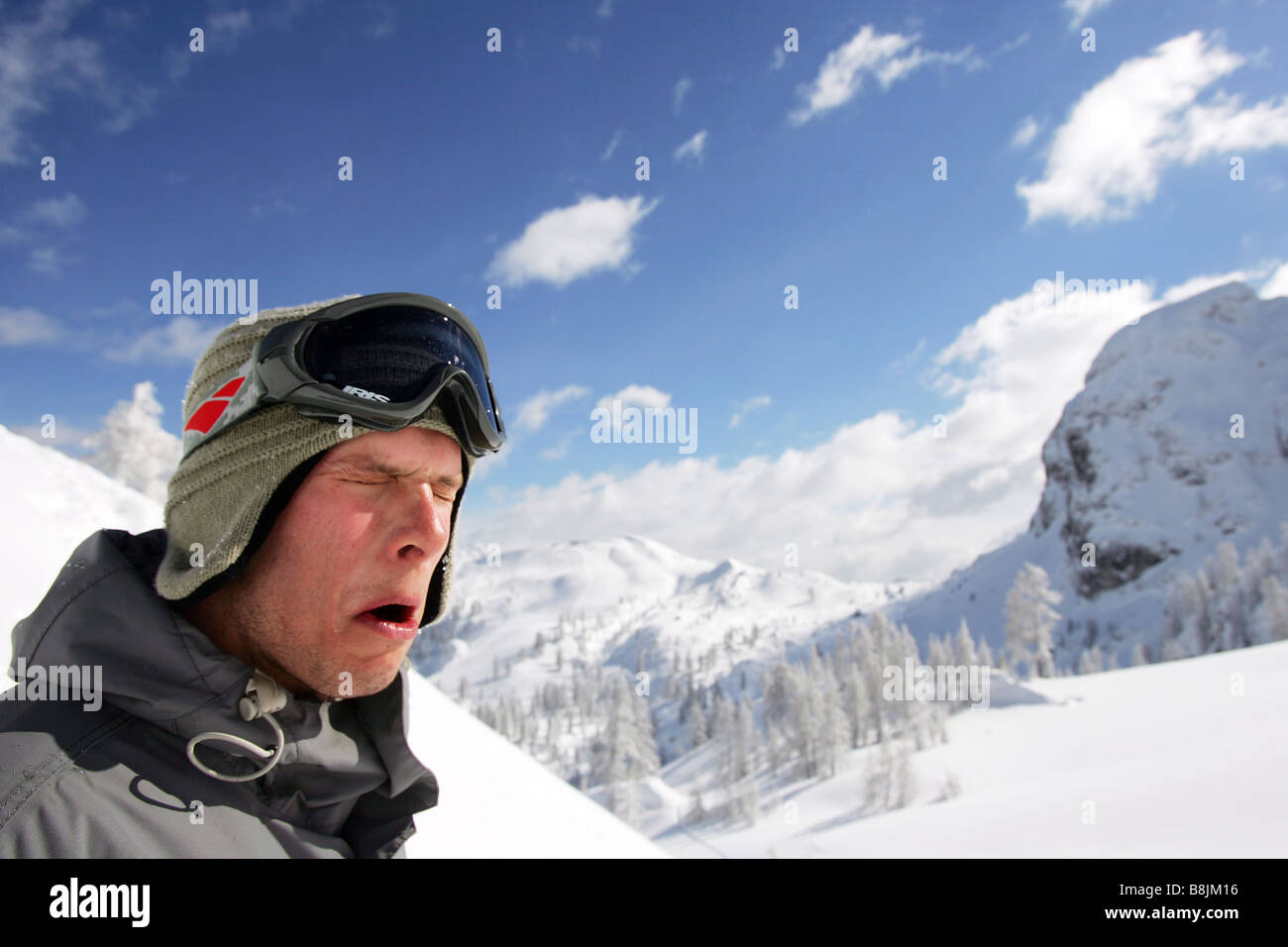 Snowboarder Maciek Swiatkowski makes a funny face in Nassfeld, Austria Stock Photo