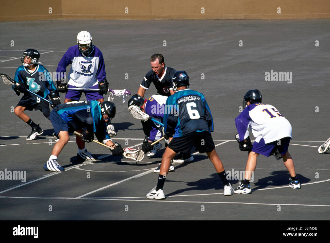 Native American Indians facing off in a Game of Lacrosse Stock Photo