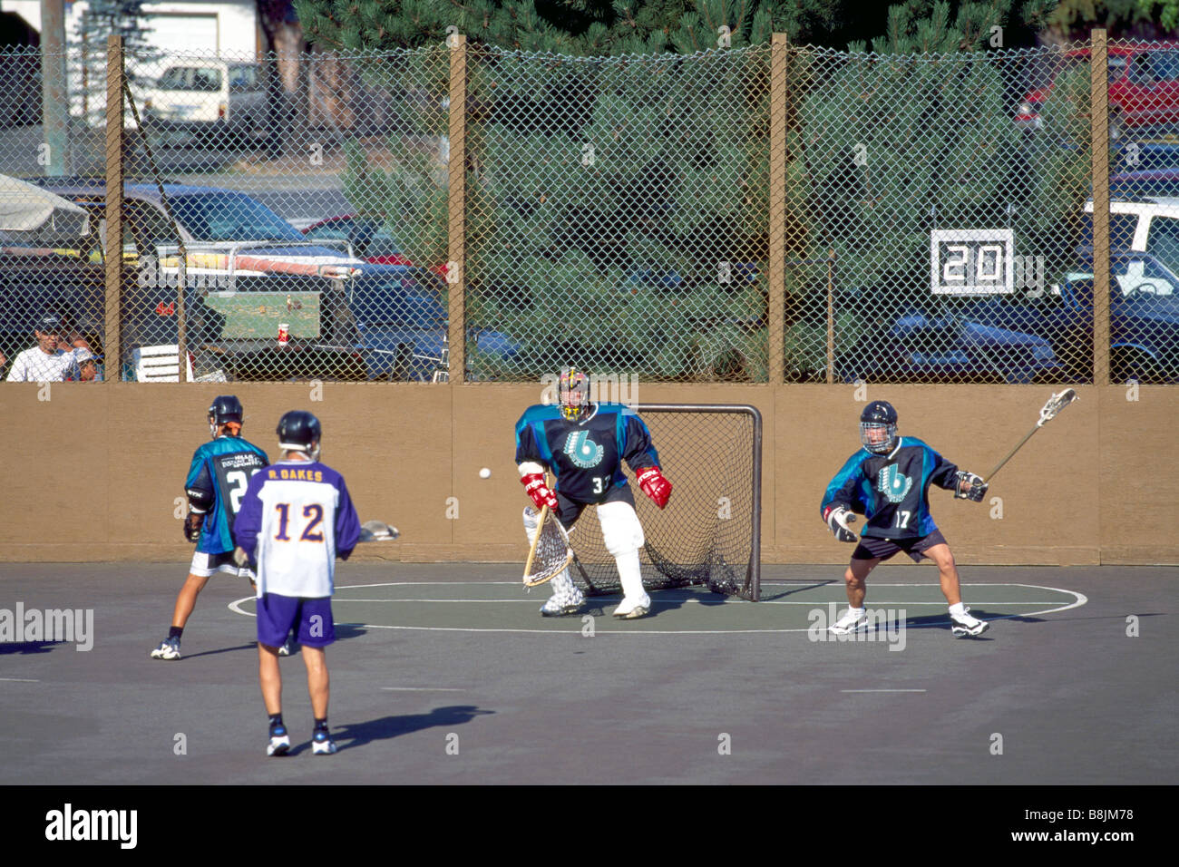 Native American Indians playing a Game of Lacrosse and Goalie defending