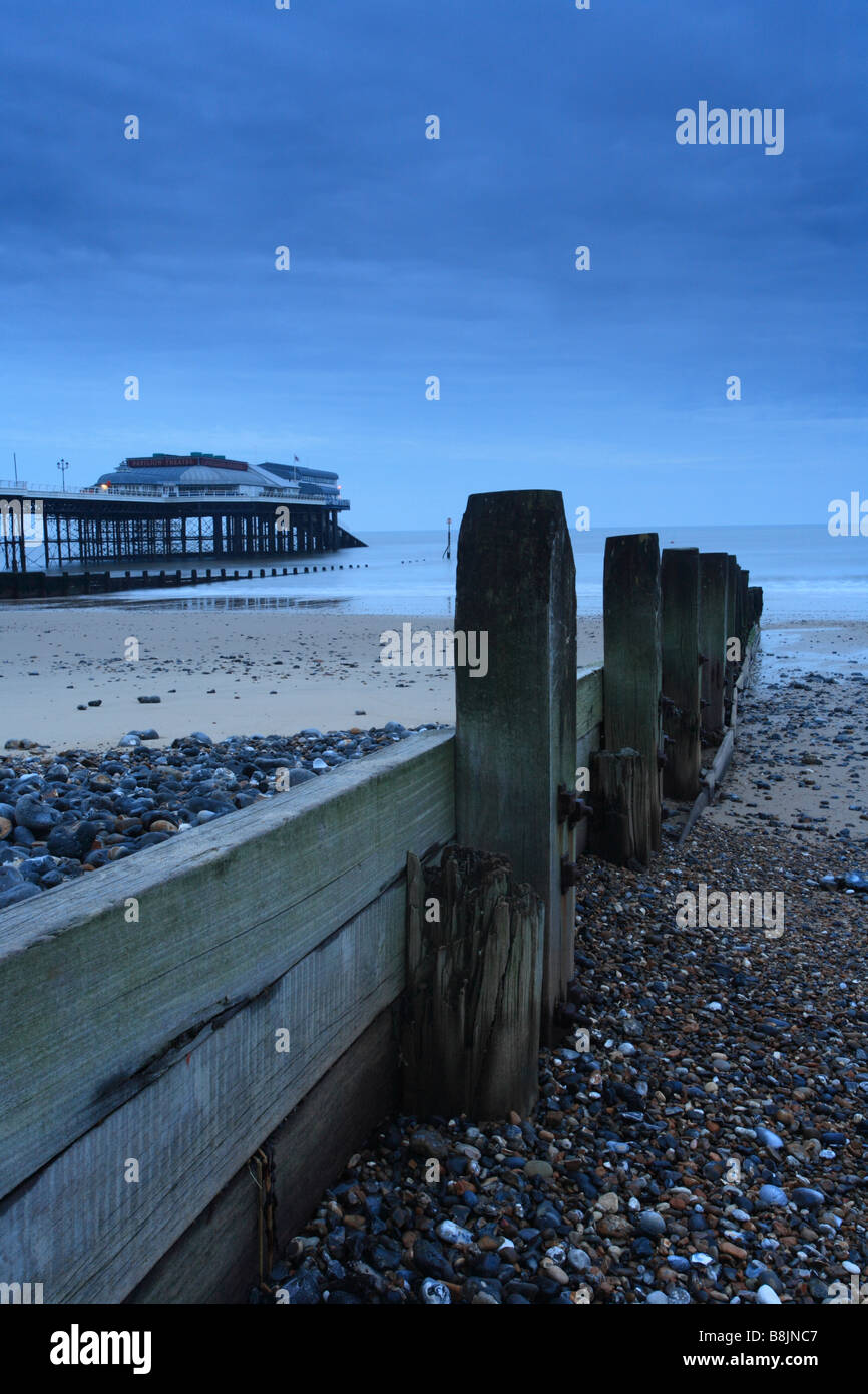 'Sea Defense' Wooden groyne, Cromer Beach & Cromer Pier, Norfolk, England, UK Stock Photo