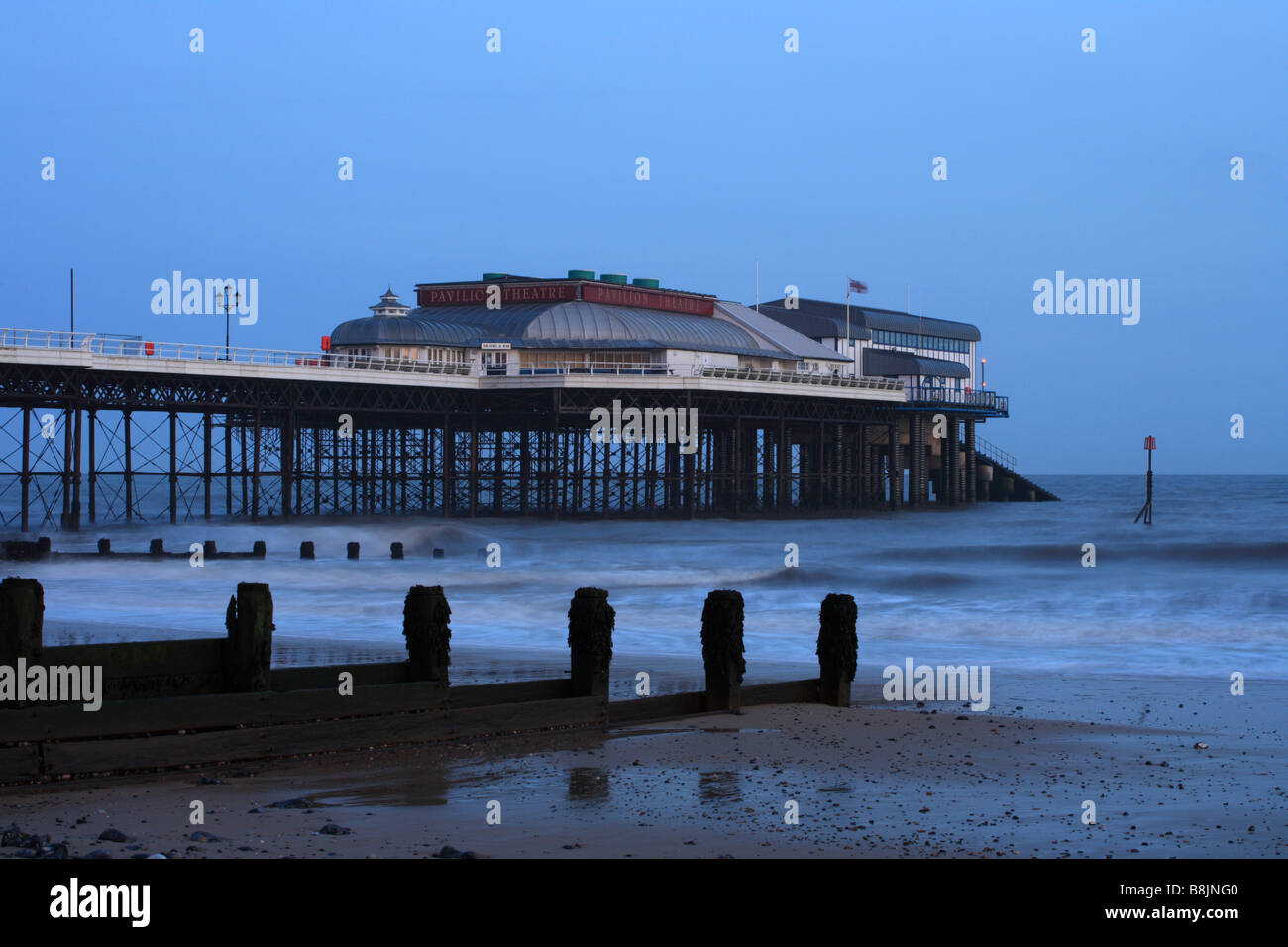 'Cromer Pier' from Cromer beach, groyne, sea defense Norfolk, East Anglia, England, UK Stock Photo