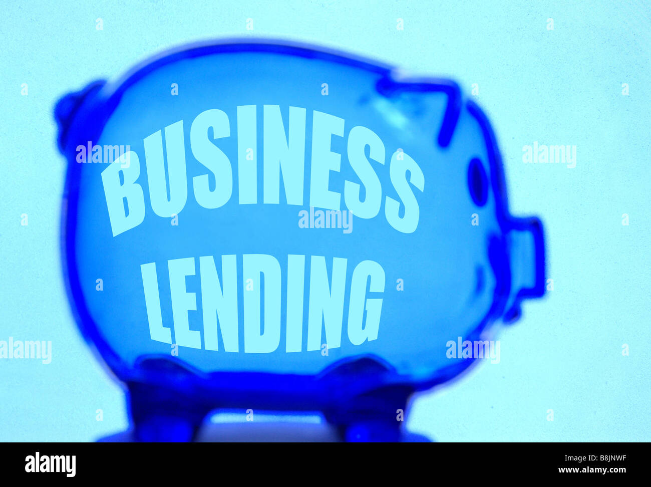 Empty piggy bank labeled Business Lending Stock Photo - Alamy