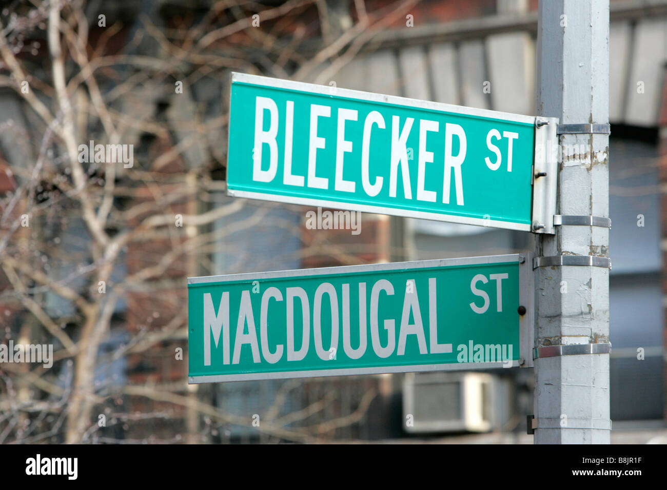 street signs at junction of Bleeker st and Macdougal street greenwich village new york city new york USA Stock Photo
