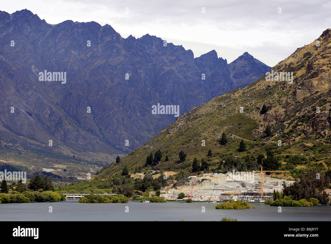 Huge building development at Kawarau Falls Station, Queenstown, New Zealand, with The Remarkables in the background Stock Photo