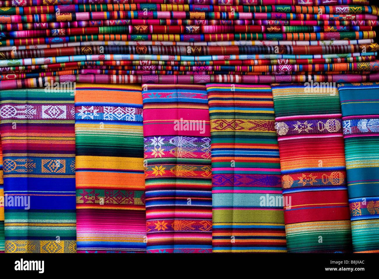 Colorful woven fabrics for sale in outdoor market in Santa Fe, New Mexico Stock Photo