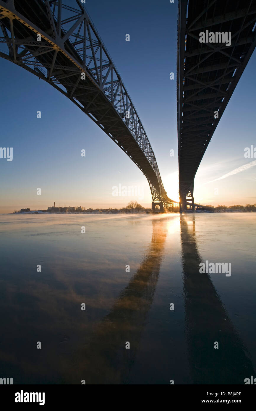 Port Huron Michigan The Blue Water Bridge across the St Clair River linking the United States and Canada Stock Photo