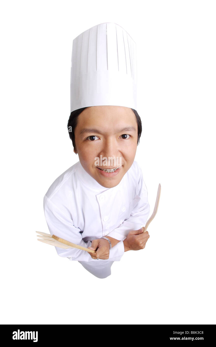 Man wearing the chef s whites and looking at the camera Stock Photo