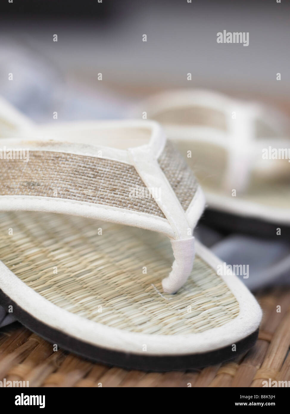 White flipflops made of straw Stock Photo Alamy