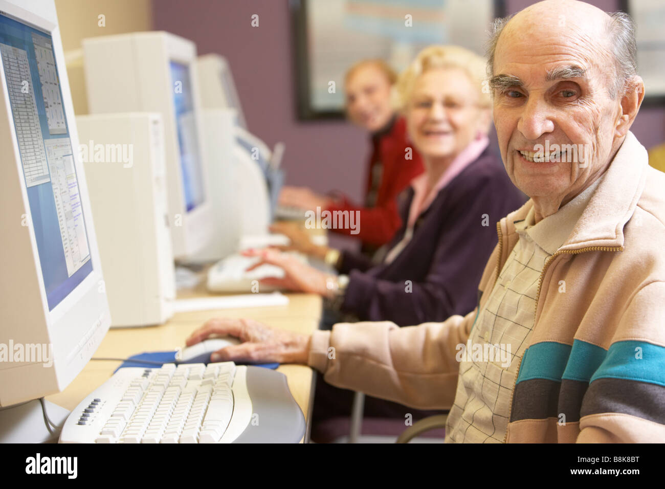 Senior man using computer Stock Photo