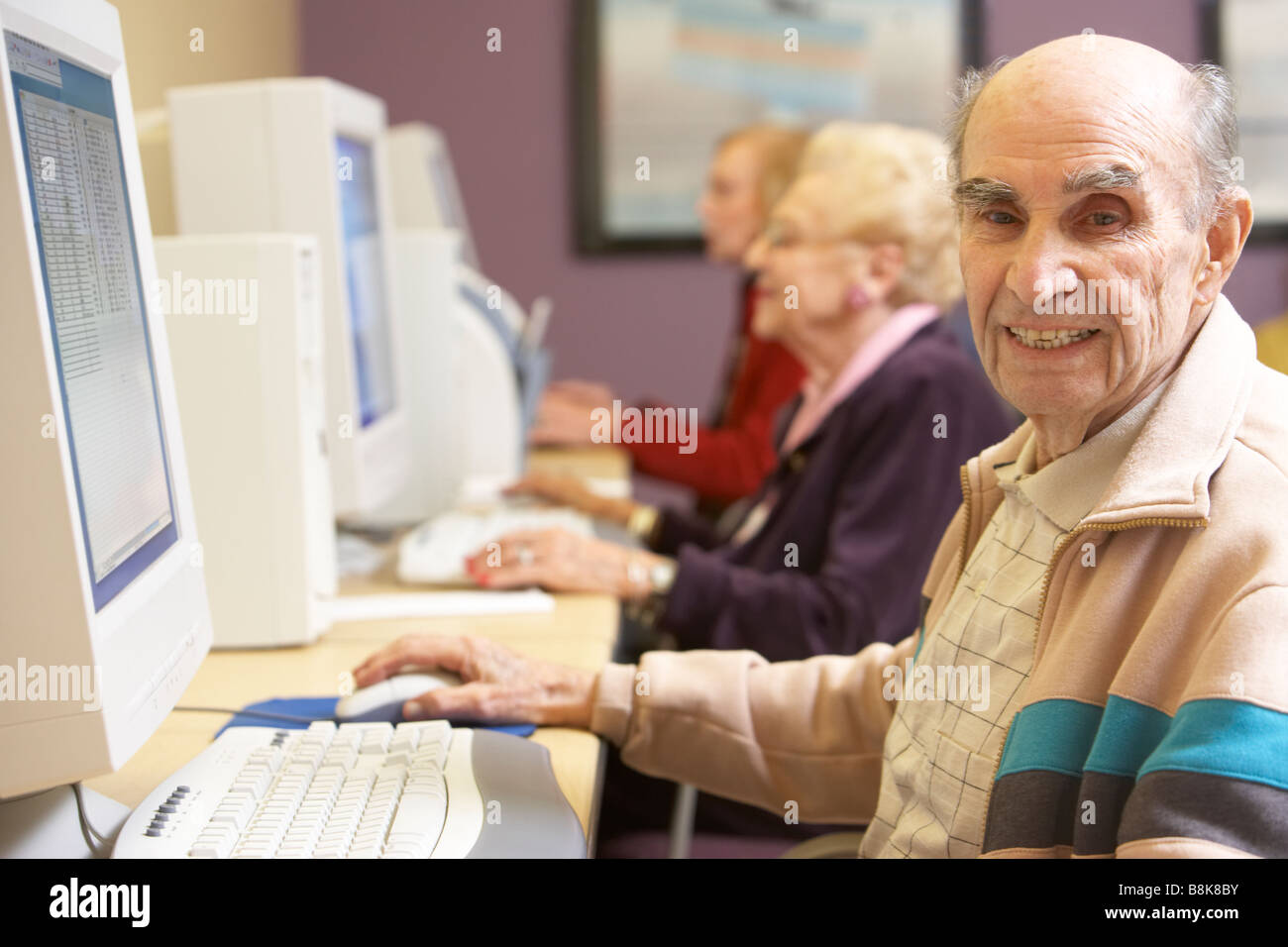 Senior man using computer Stock Photo