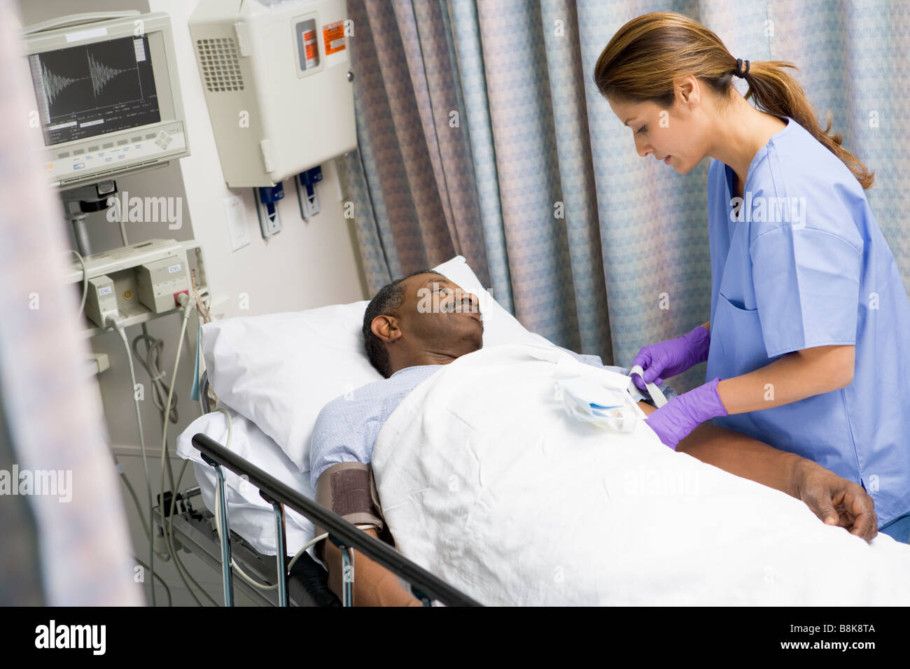 Nurse Caring For Patient Stock Photo Alamy