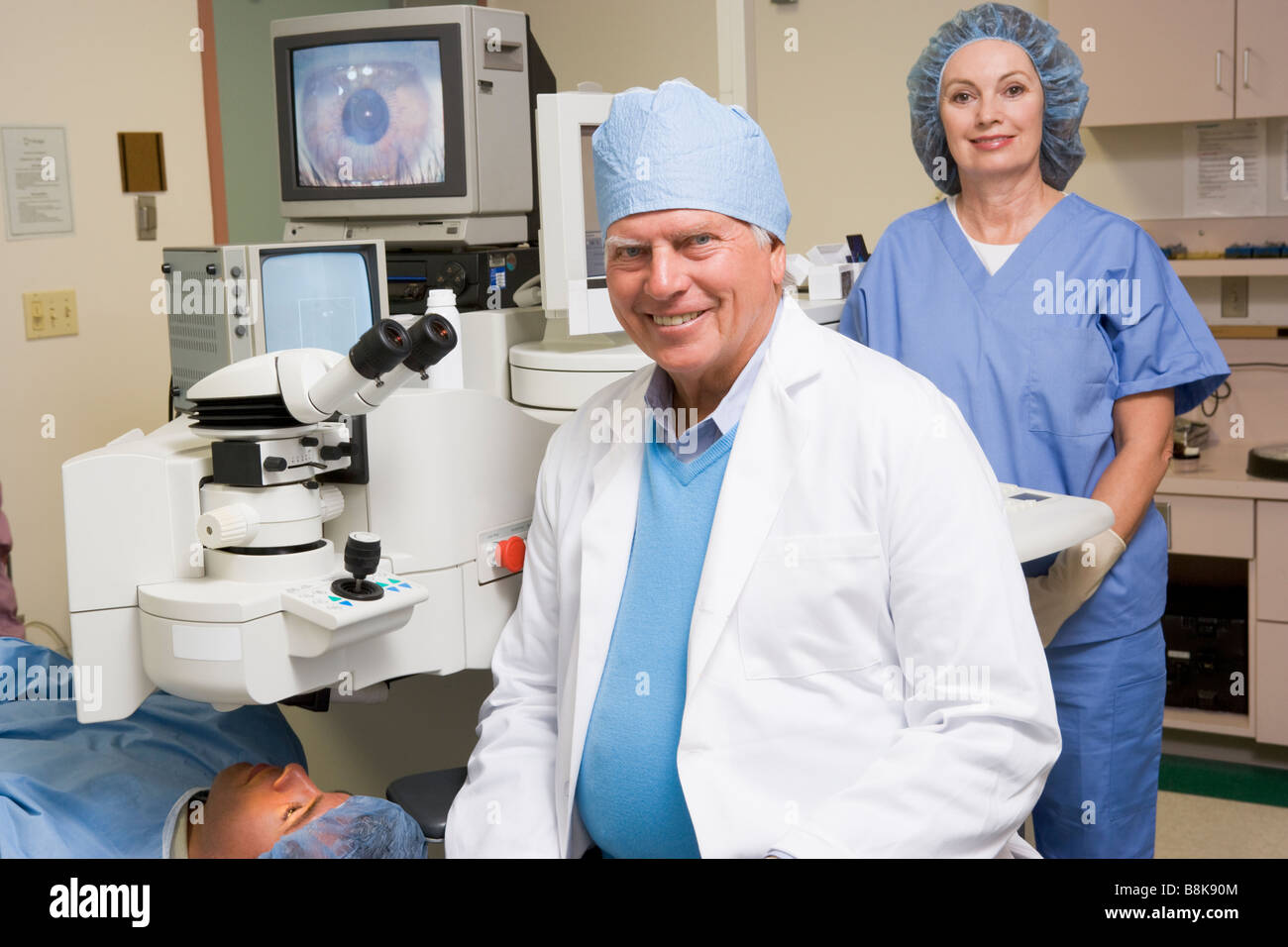 Doctor, Nurse And Patient About To Undergo Eye Exam Stock Photo