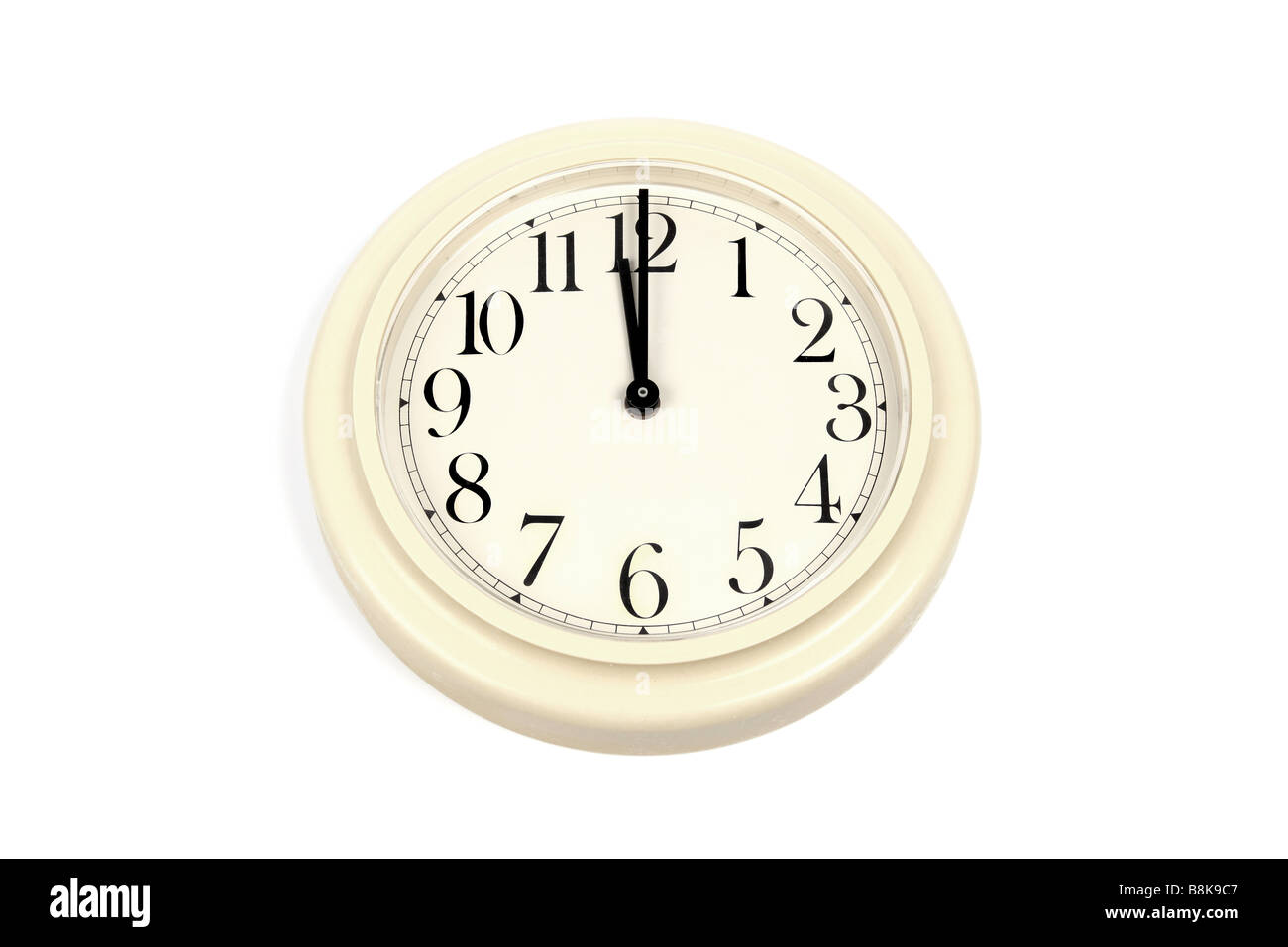 Wall clock against a white background Stock Photo
