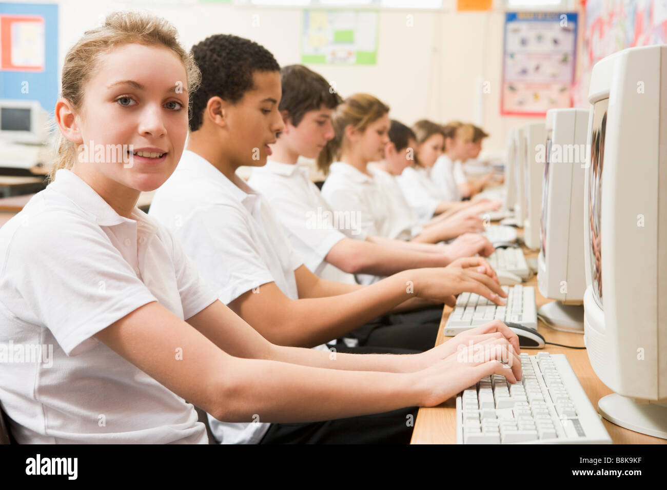 Students working on computer workstations Stock Photo Alamy