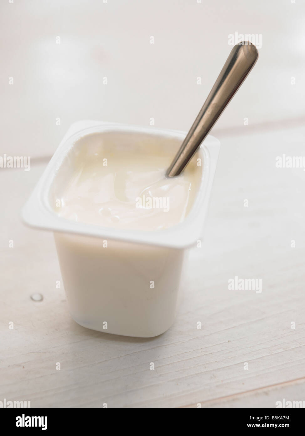 yogurt with spoon Stock Photo Alamy