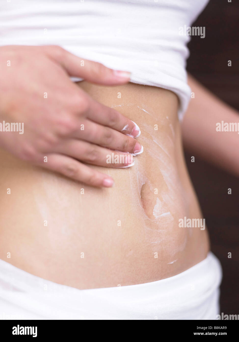 slim belly,creme massage Stock Photo